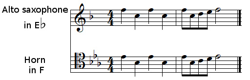transpose at sight from E♭ to F using a tenor clef